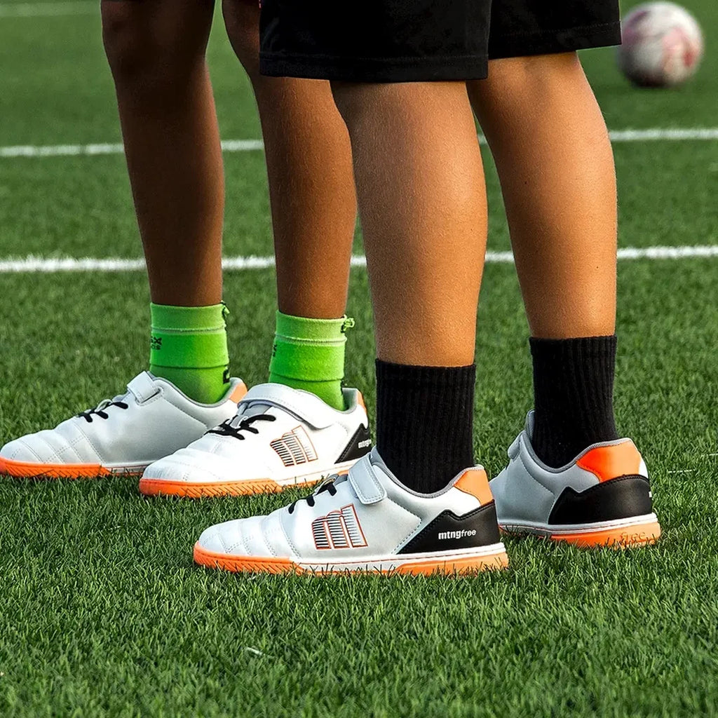 Mustang Gamon botas de futbol multitaco para niños